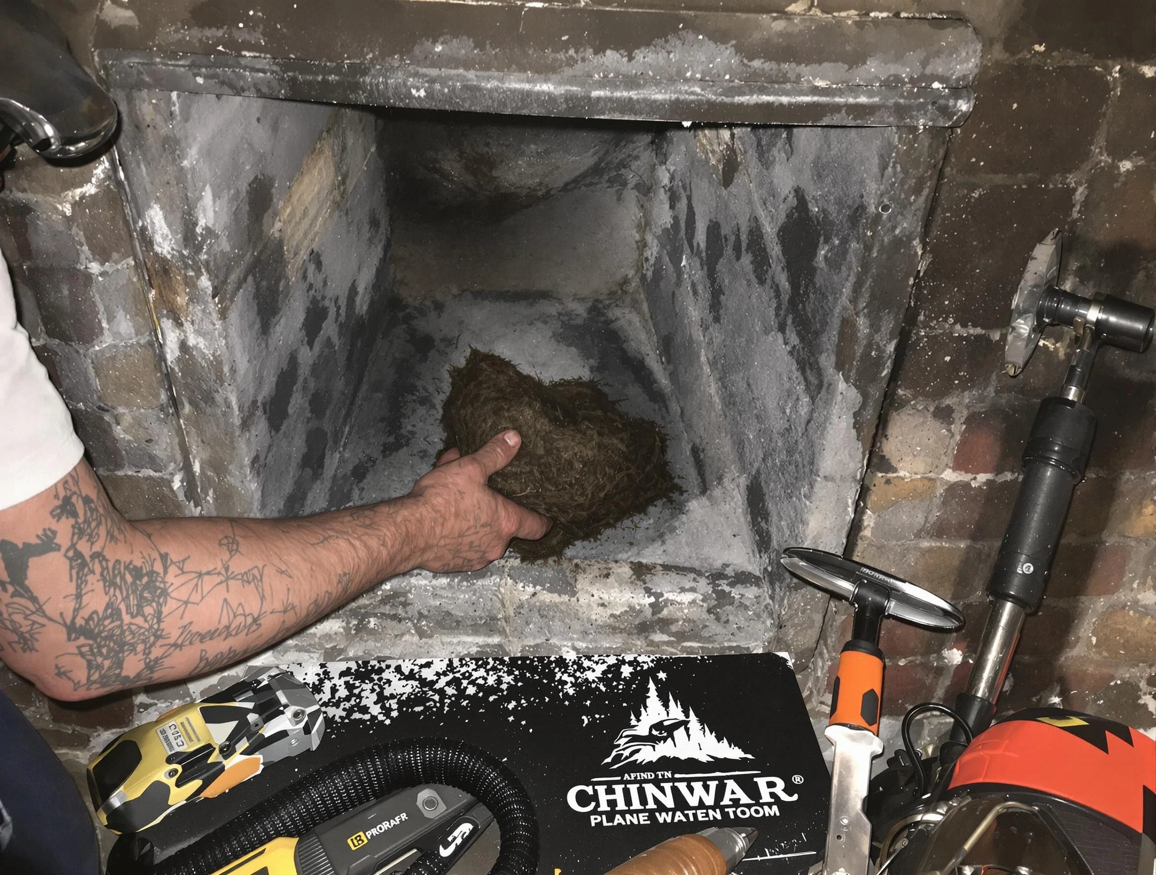 Dacula Chimney Sweep safely removing debris and screening chimney in Dacula, GA