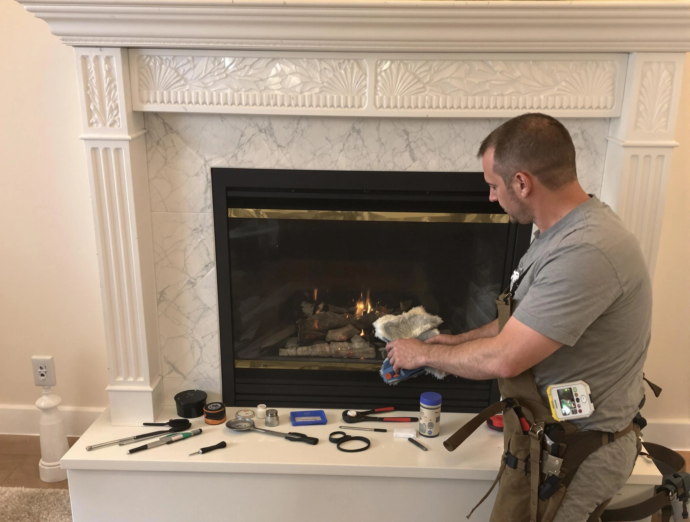 Dacula Chimney Sweep performing fireplace maintenance in Dacula, GA